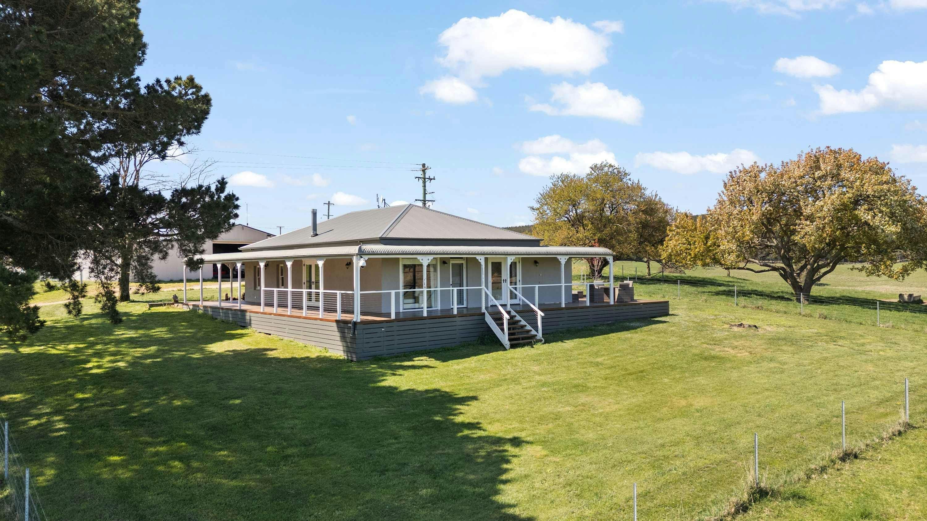 yard with fence, wrap around verandah and outdoor dining area
