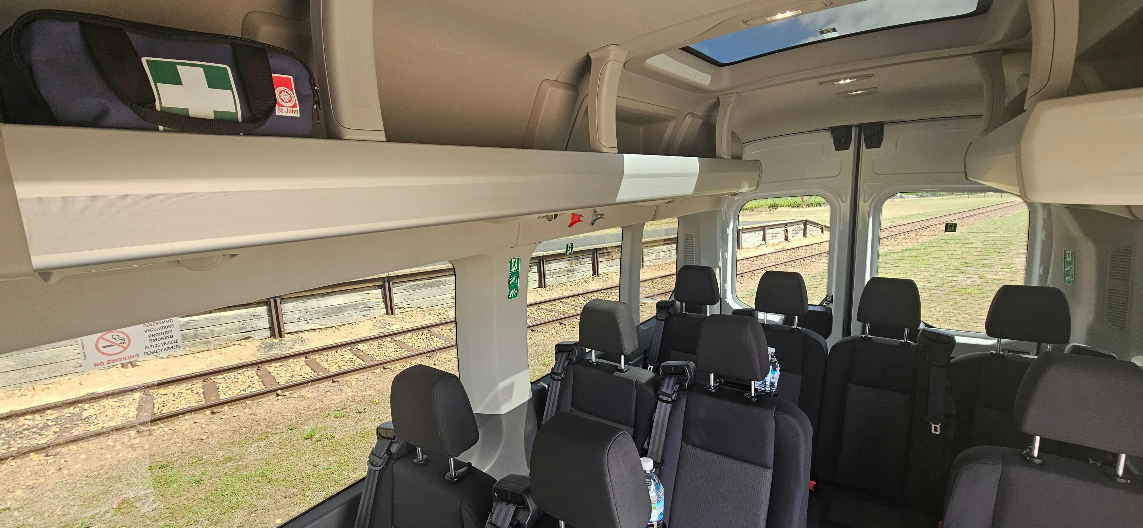 Spacious interior of Ford Transit tour vehicle with high roof used for Coonawarra wine tours