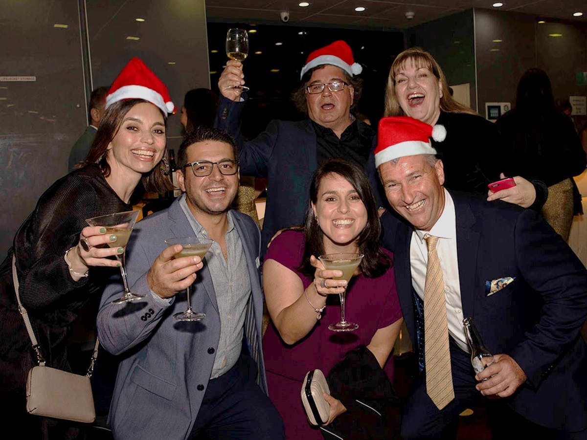 People celebrating on the Clearview Christmas party cruise