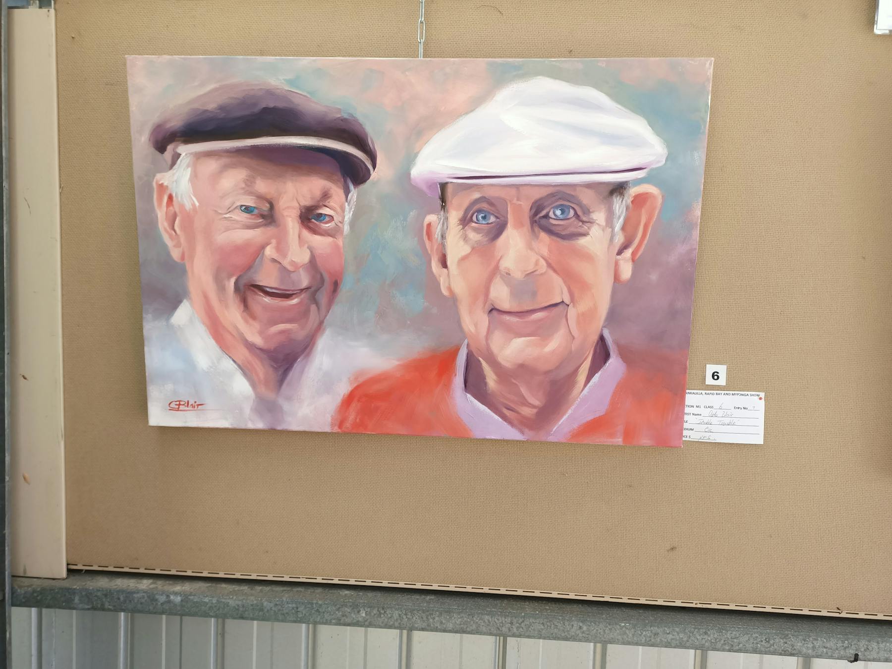 Painting of two older men in cloth caps with the title Double Trouble