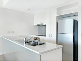 Kitchen in 2 Bedroom Apartment at ULTIQA Freshwater Point Resort