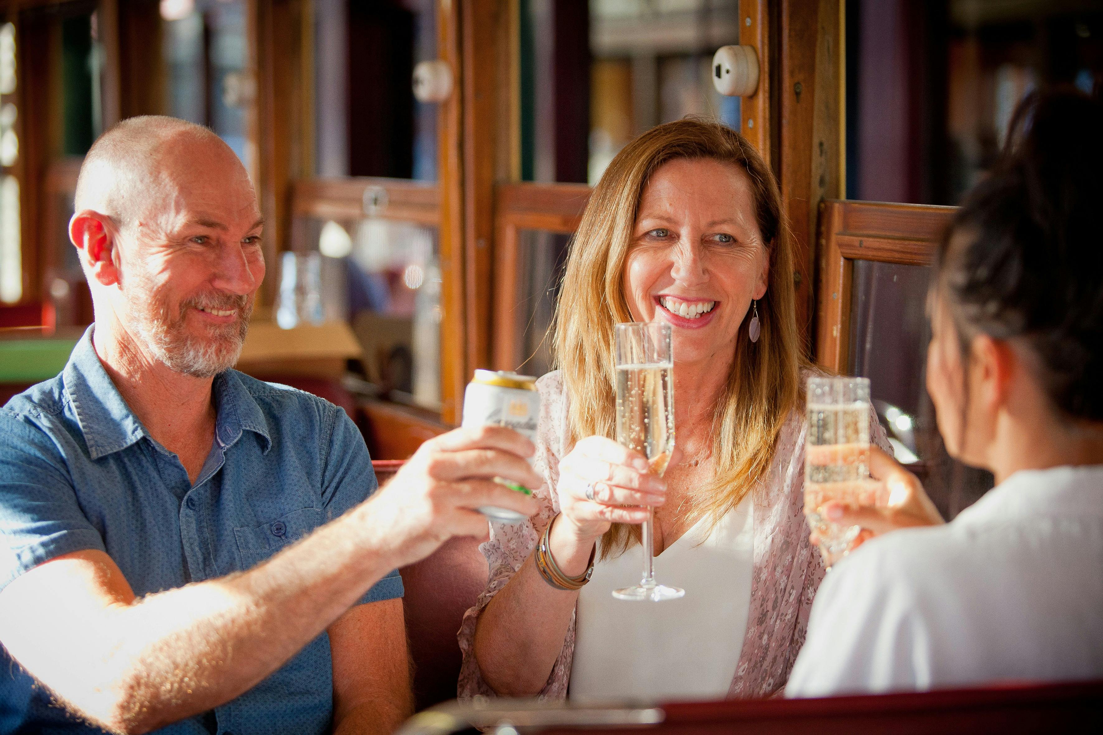 Enjoying a drink on the Groove Tram