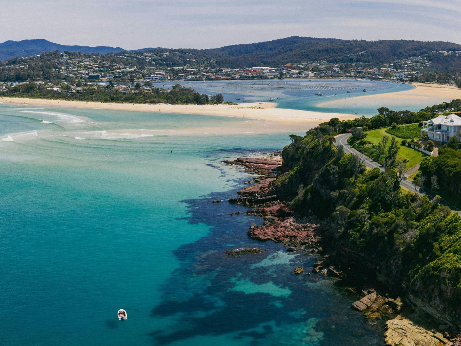 Aerial view of a scenic coastal lookout overlooking the sea
