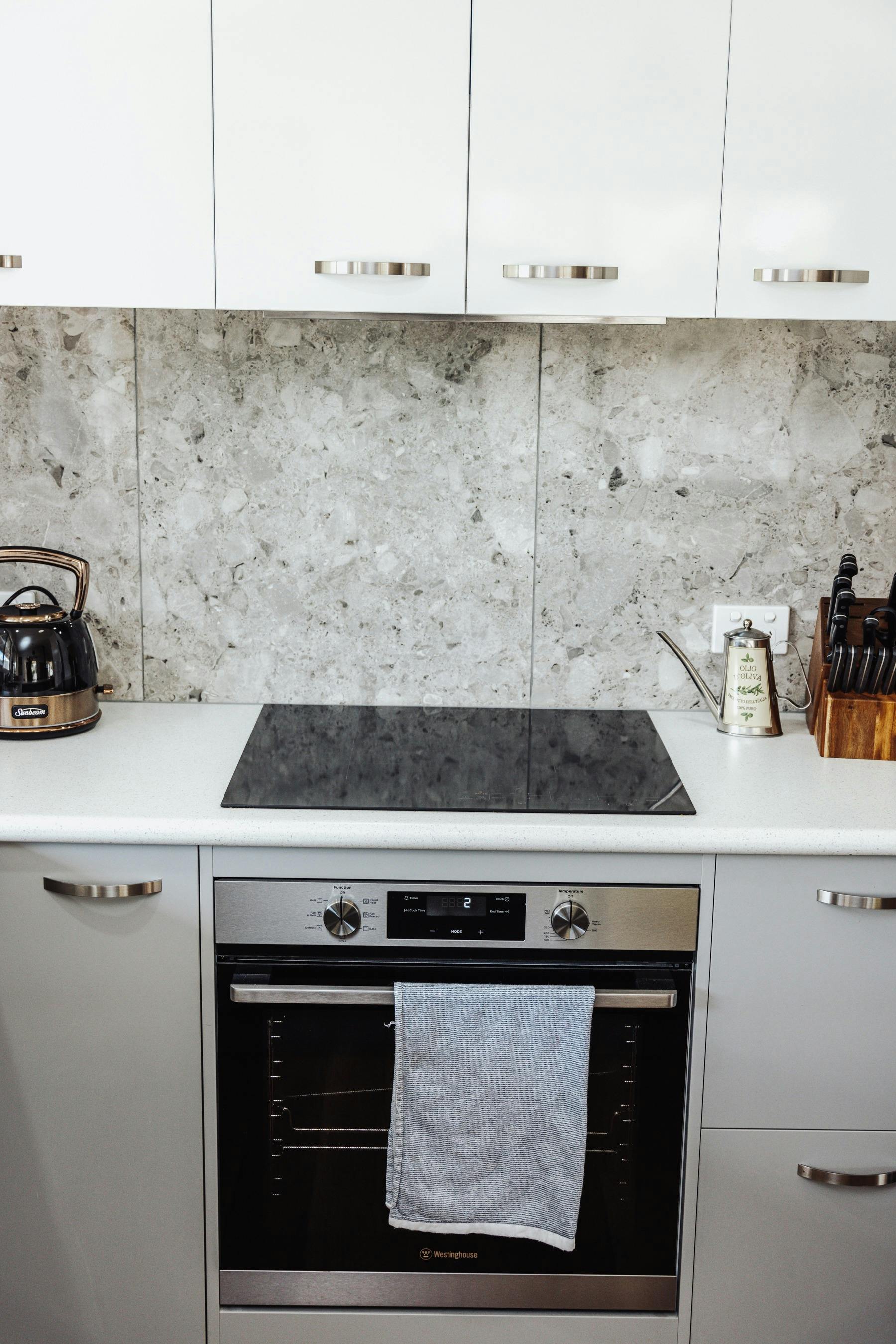 Fully equipped kitchen with oven stove top, fridge, coffee machine, toaster and kettle provided