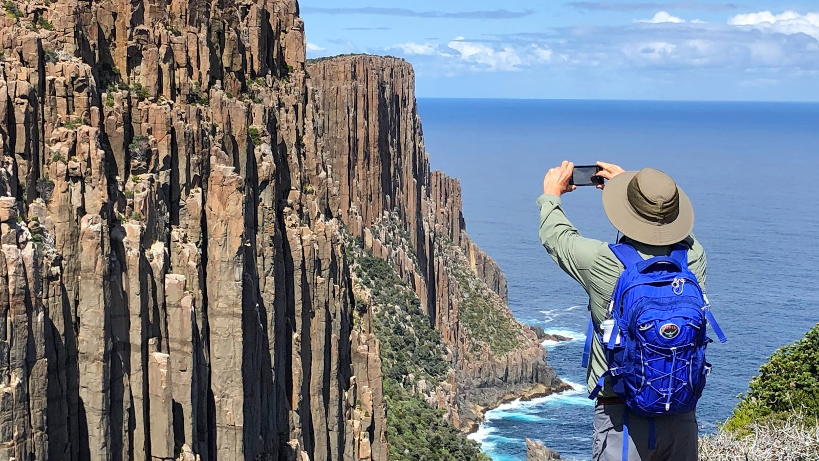 Capturing the towering sea cliffs of the Three Capes Walk, one of Tasmania’s most iconic coastal exp