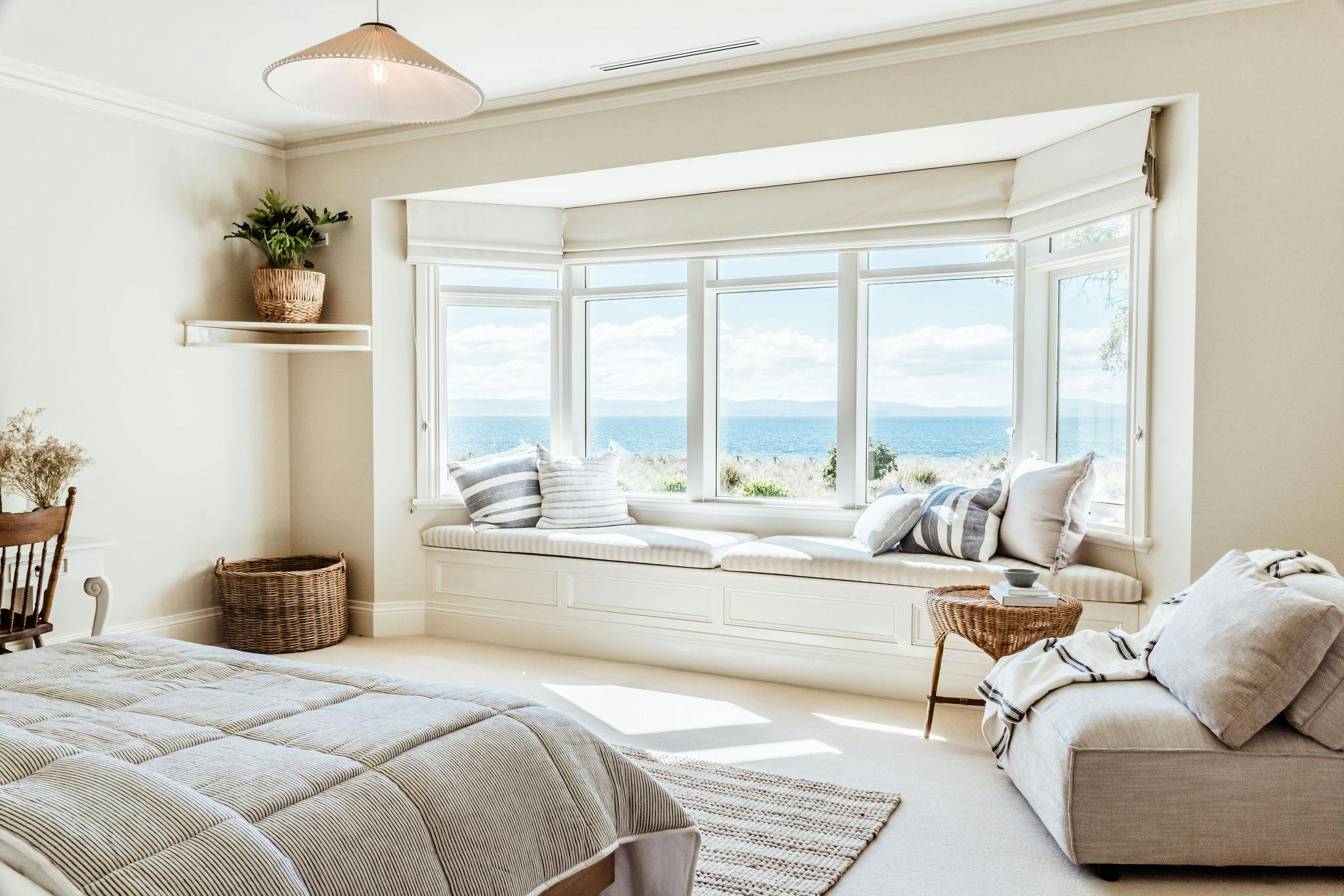 The window seat and ocean view form the master bedroom