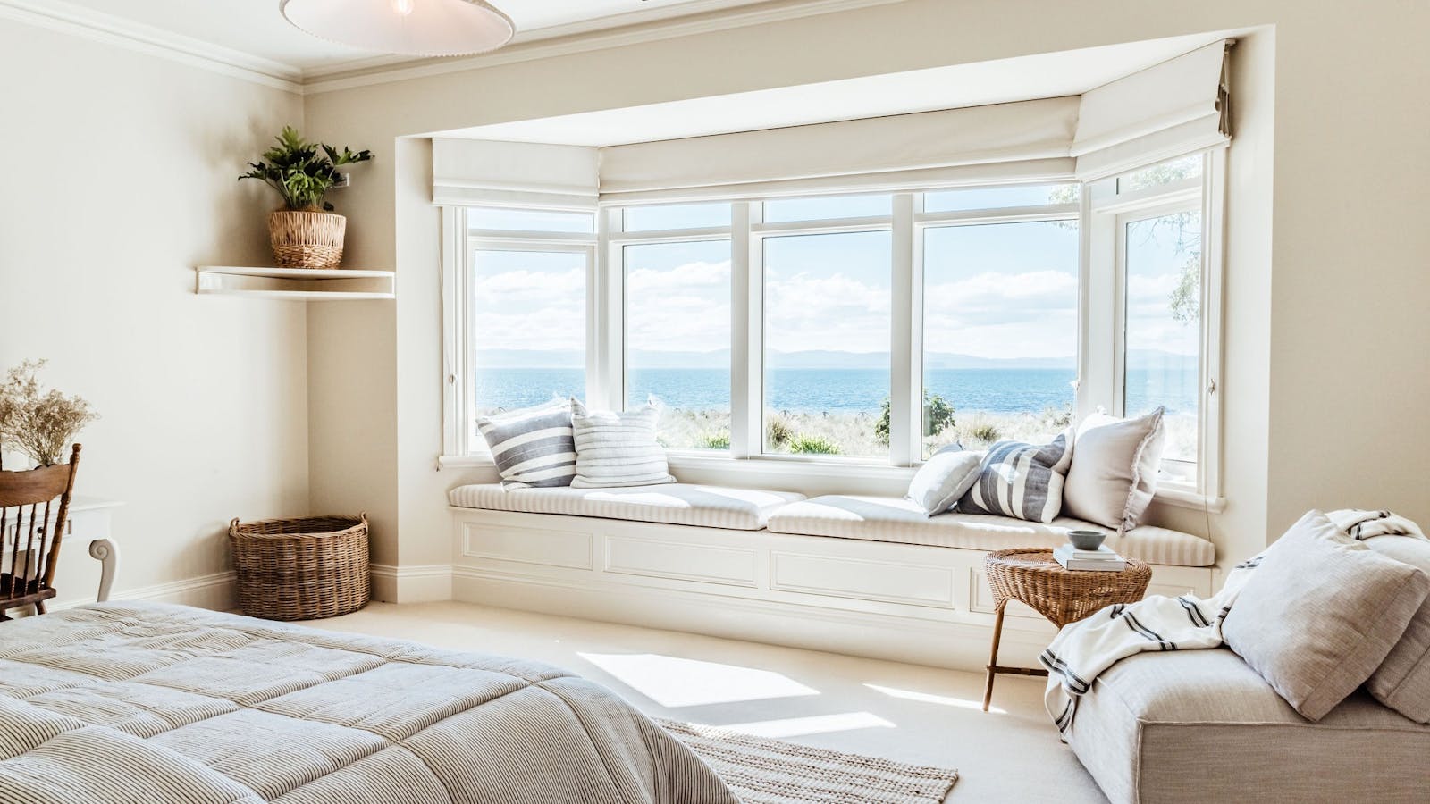 The window seat and ocean view form the master bedroom