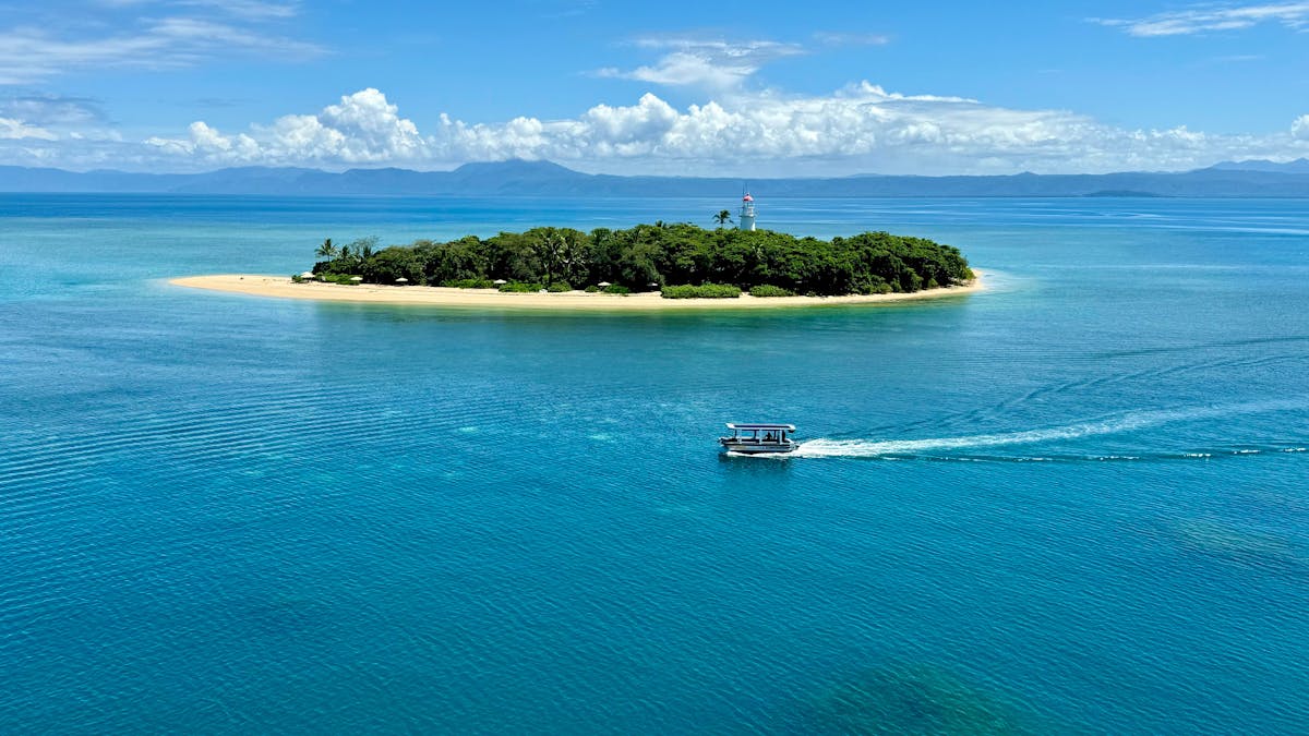 Electric Glass Bottom Boat 100% electric viewing the Low Isles Lagoon on the Great Barrier Reef