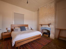 This beautifully appointed queen bedroom features plush Sheridan bedding, delivering comfort