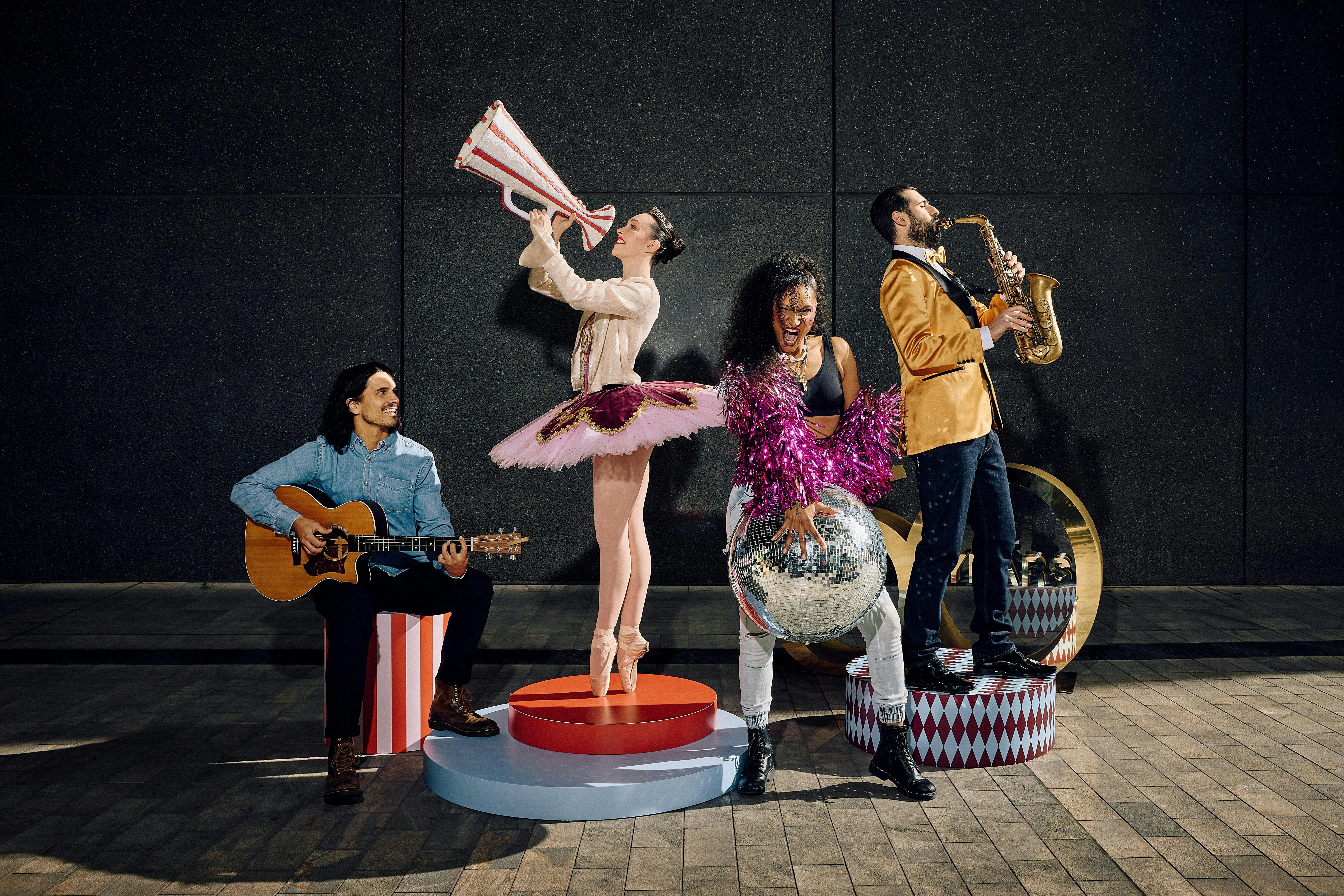 A group of performers posed as a group