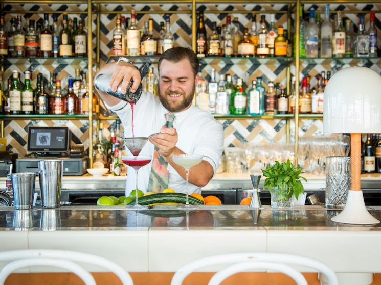 Bartender creating a cocktail at Henry Deane