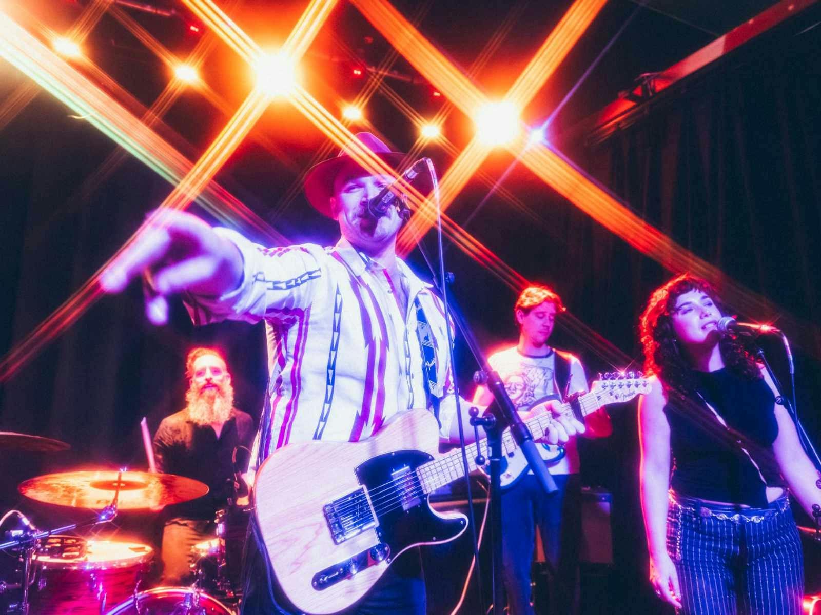 a photo of the band performing