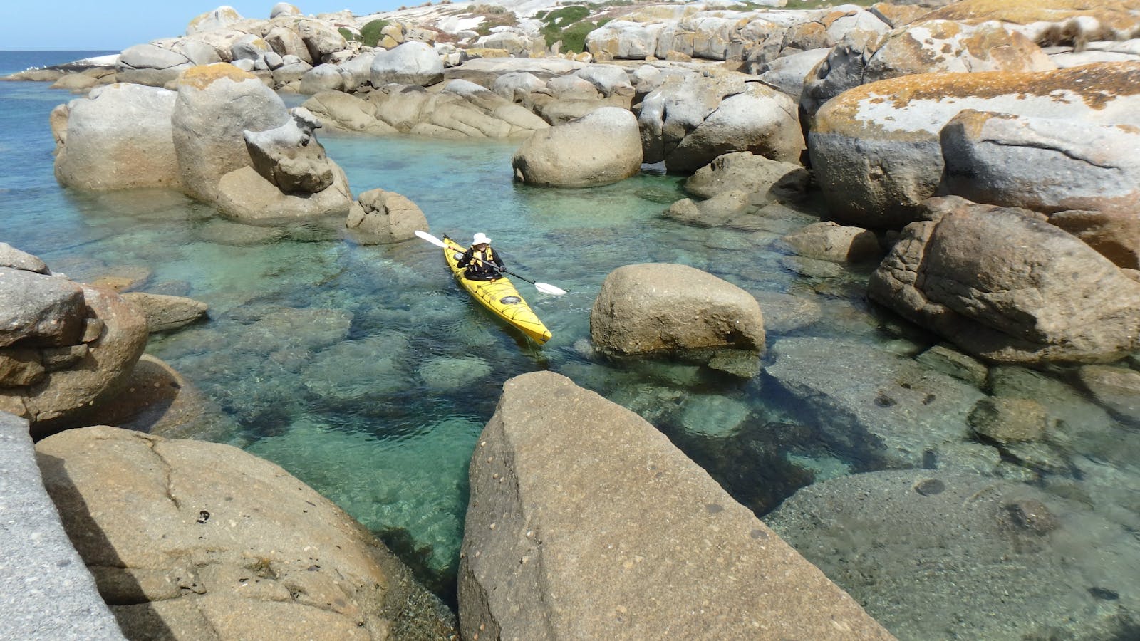 Kayaking amongst the rocks on Flinders Island