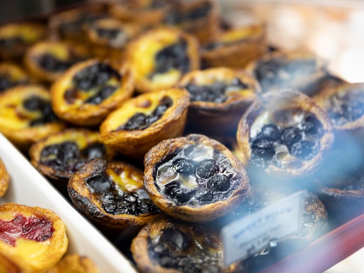 Blueberry Portuguese tarts available for purchase from Sweet Belem Cake Boutique, Petersham