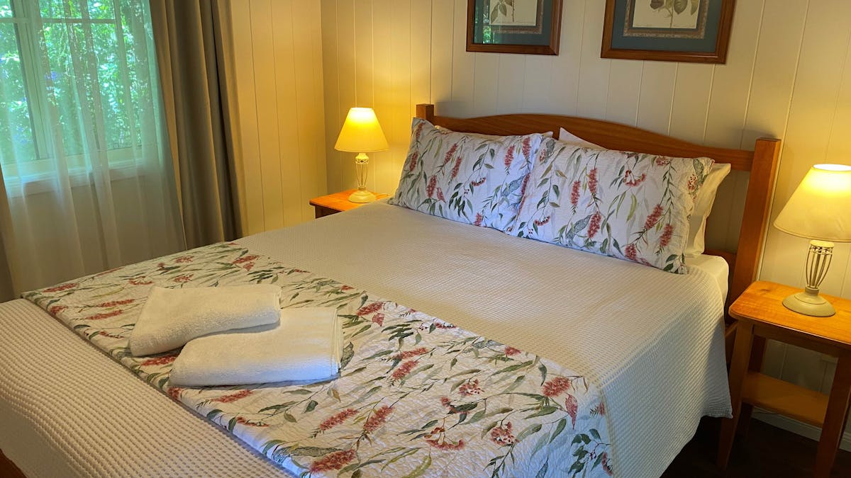 Queen bed with bedside tables Queen bed with bedside tables