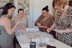 women making earrings