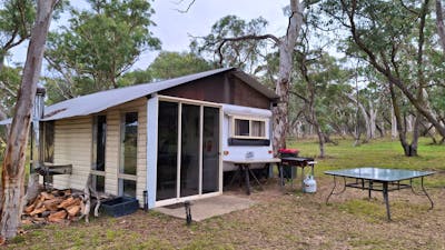 Caravan with annex set amongst the gum trees