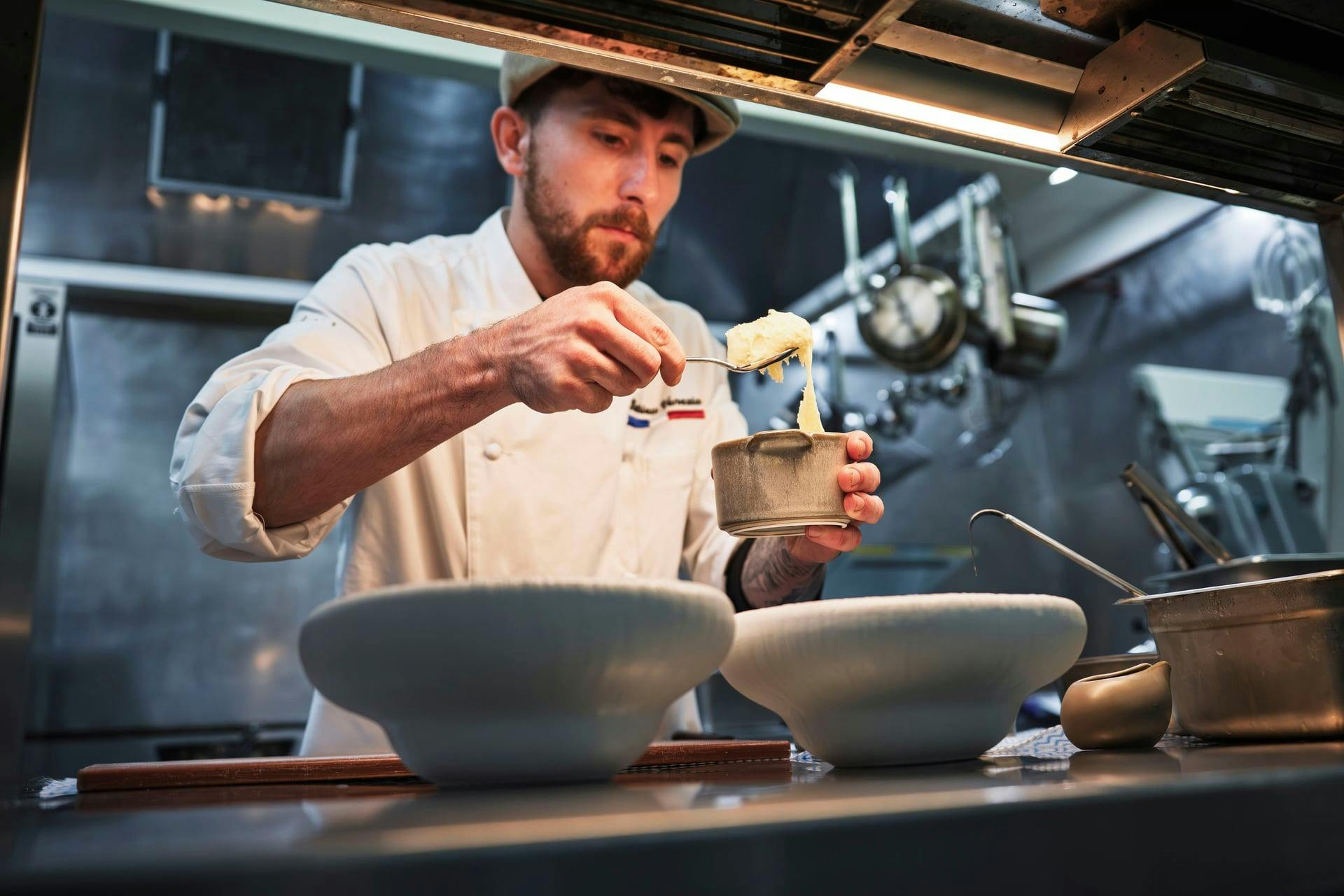 Chef making food at Charlotte's Restaurant