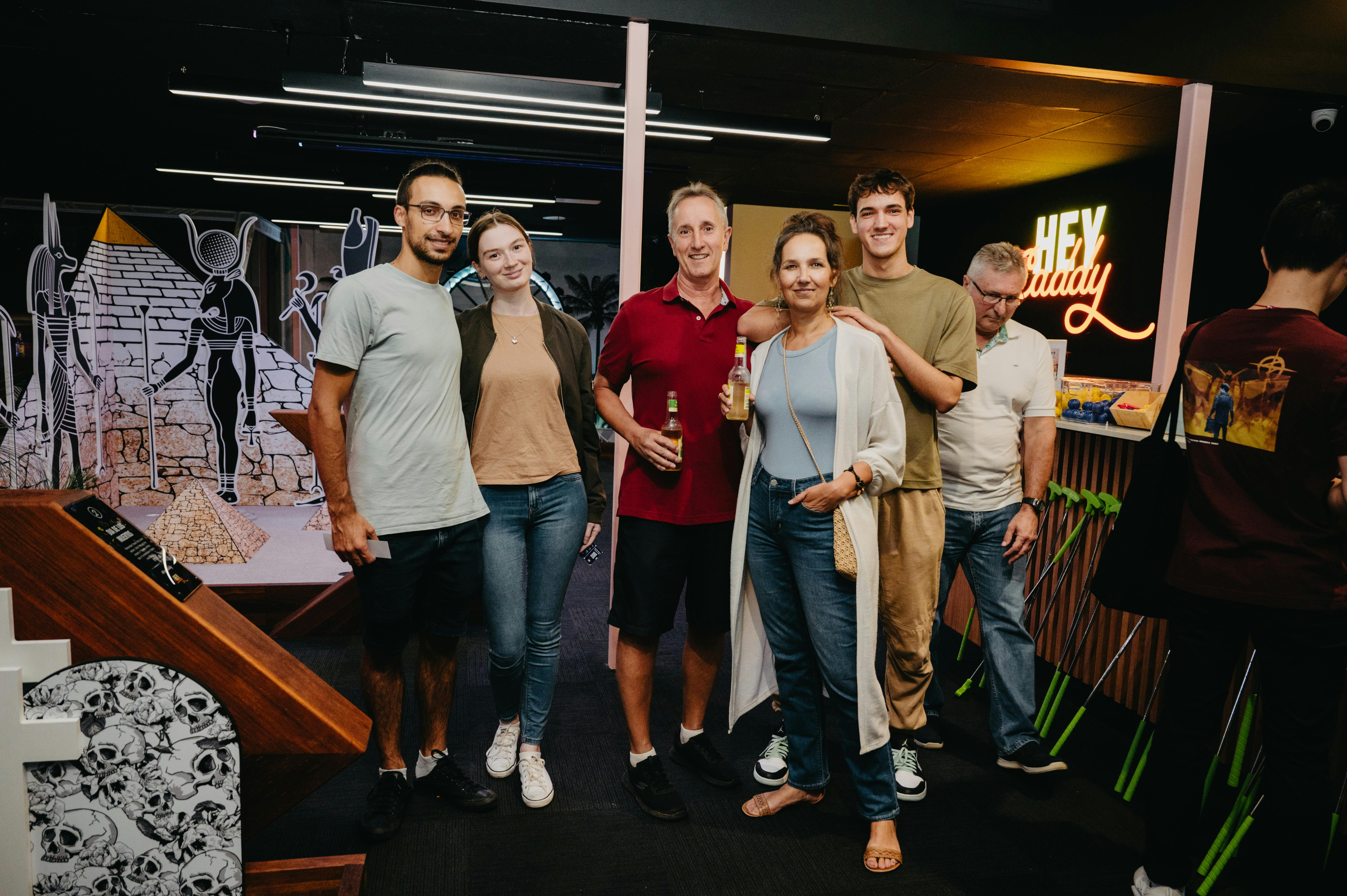 Guests smiling while playing at Hey Caddy Macarthur