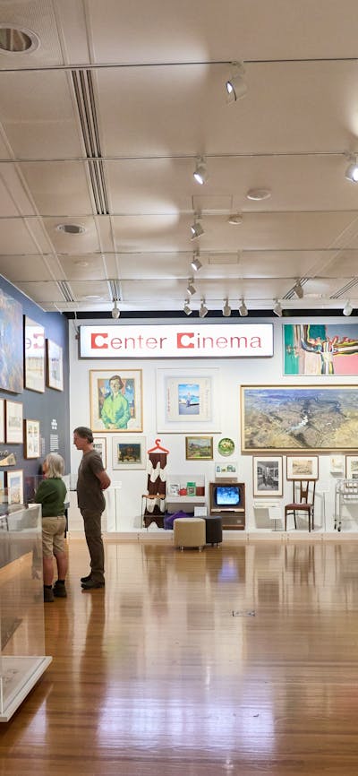 Exhibition image featuring people exploring the Canberra/Kamberri Exhibition