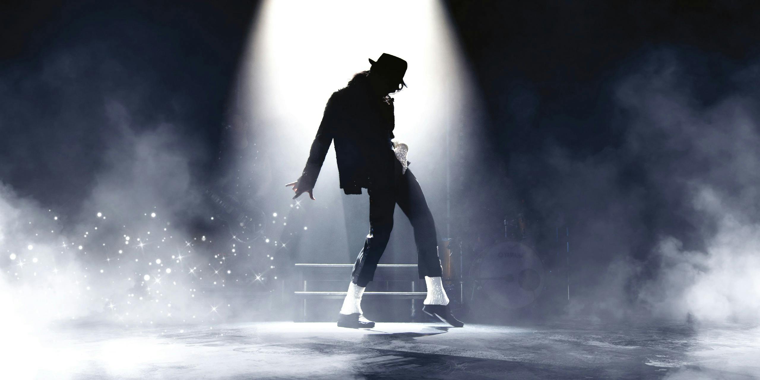 dancer on stage in shadow