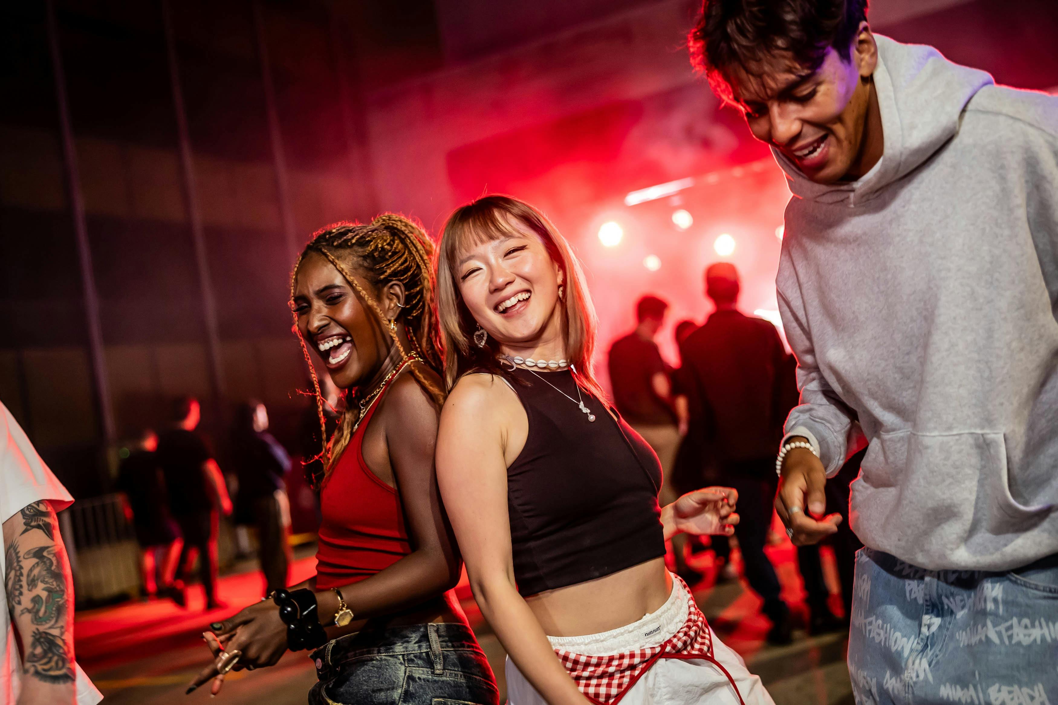 Two women dancing at Parramatta Lanes