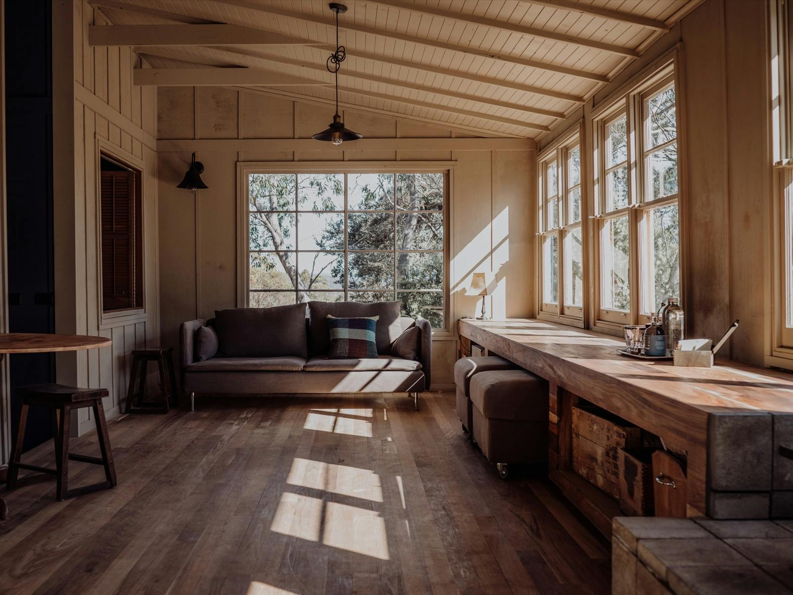 A gorgeous large vintage picture window gives hints of the Great Lake.