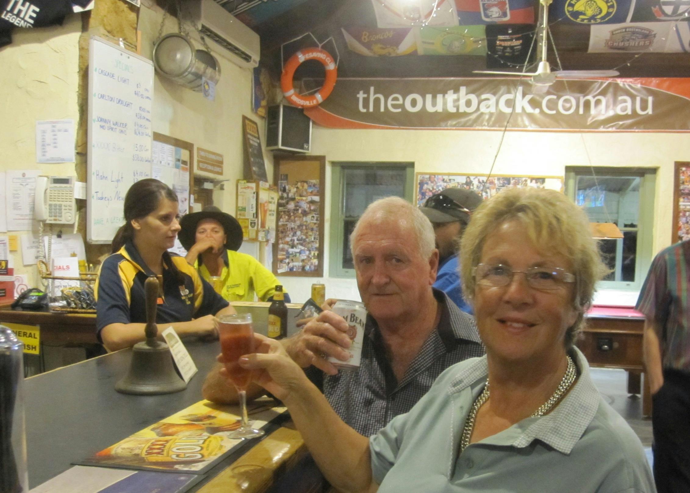 Couple having drinks inside the Birdsville Hotel