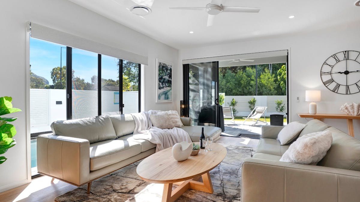 Open plan living area with balcony access Open plan living area with balcony access