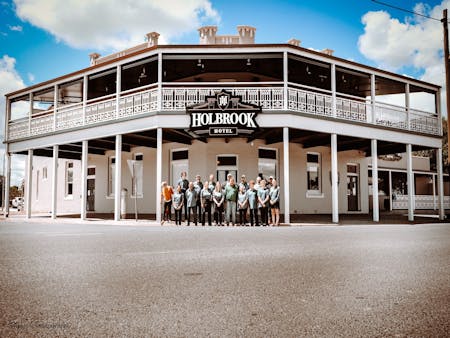 Holbrook Hotel Staff standing out the front of the building.