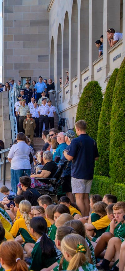 A large group of people attending the Last Post Ceremony at the Australian War Memorial