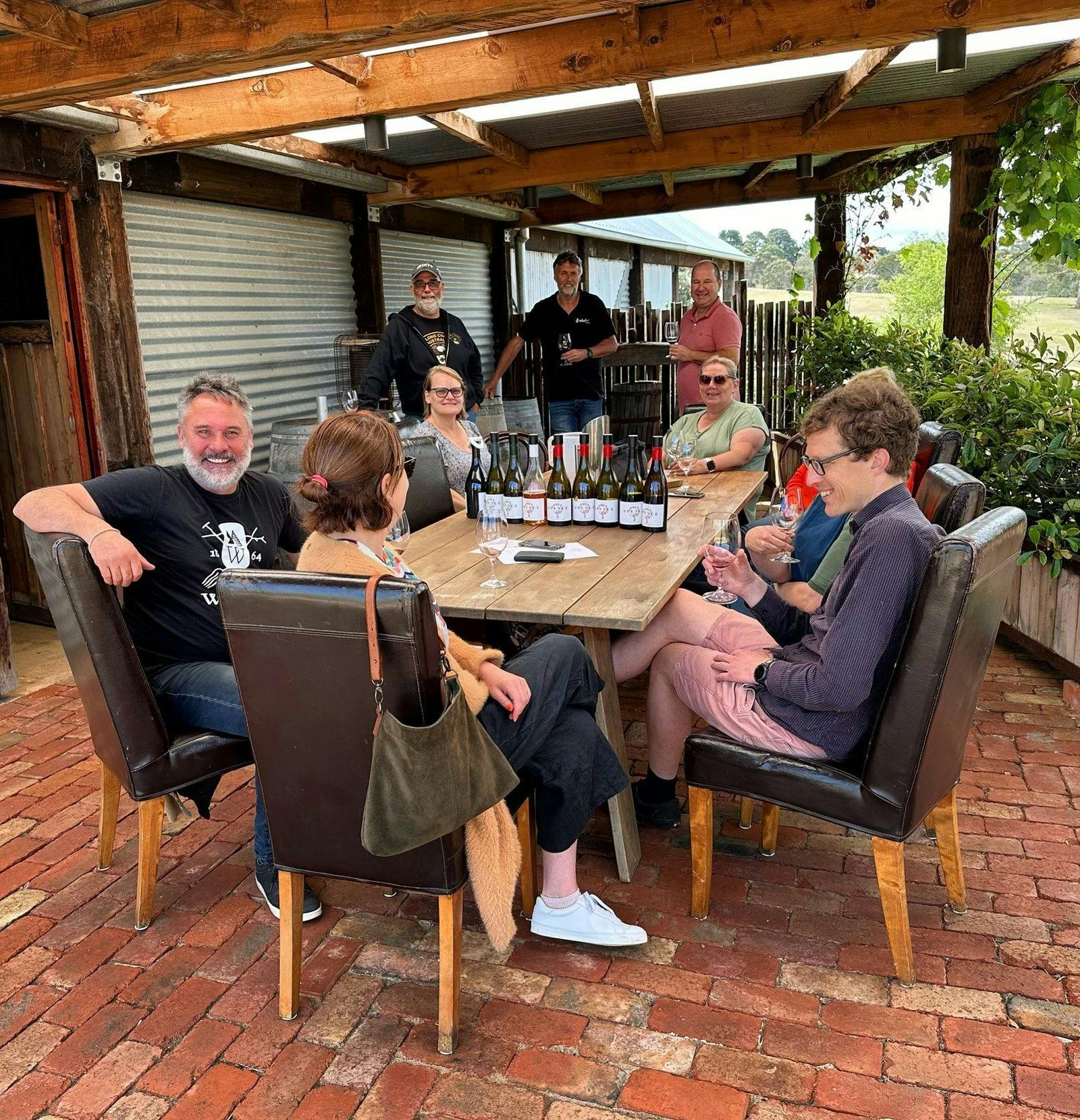 Visitors enjoying a wine tasting at the cellar door