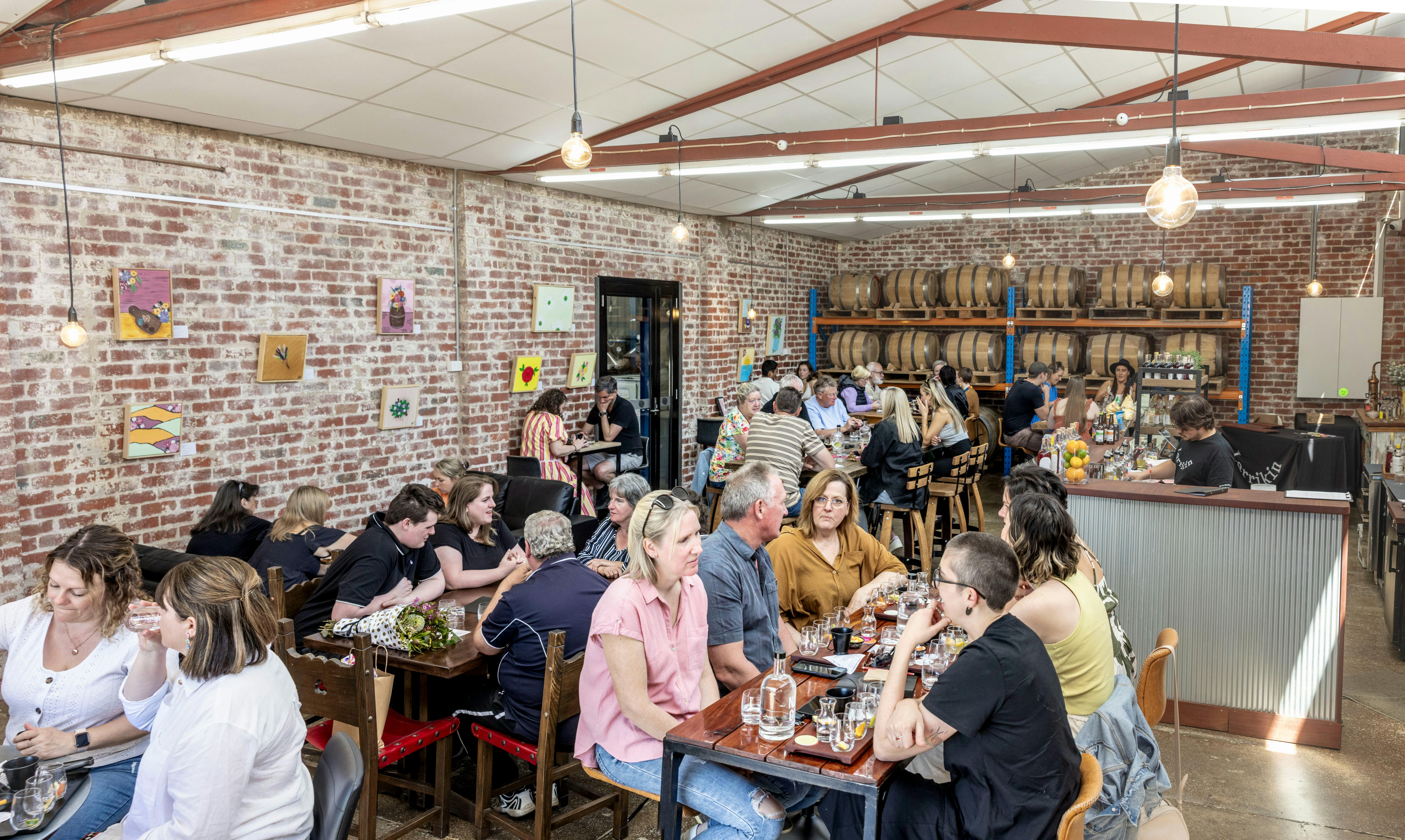 Venue filled with people seated at tables