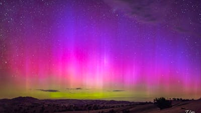 The yellows pinks and purple of a strong display of the Aurora Australis