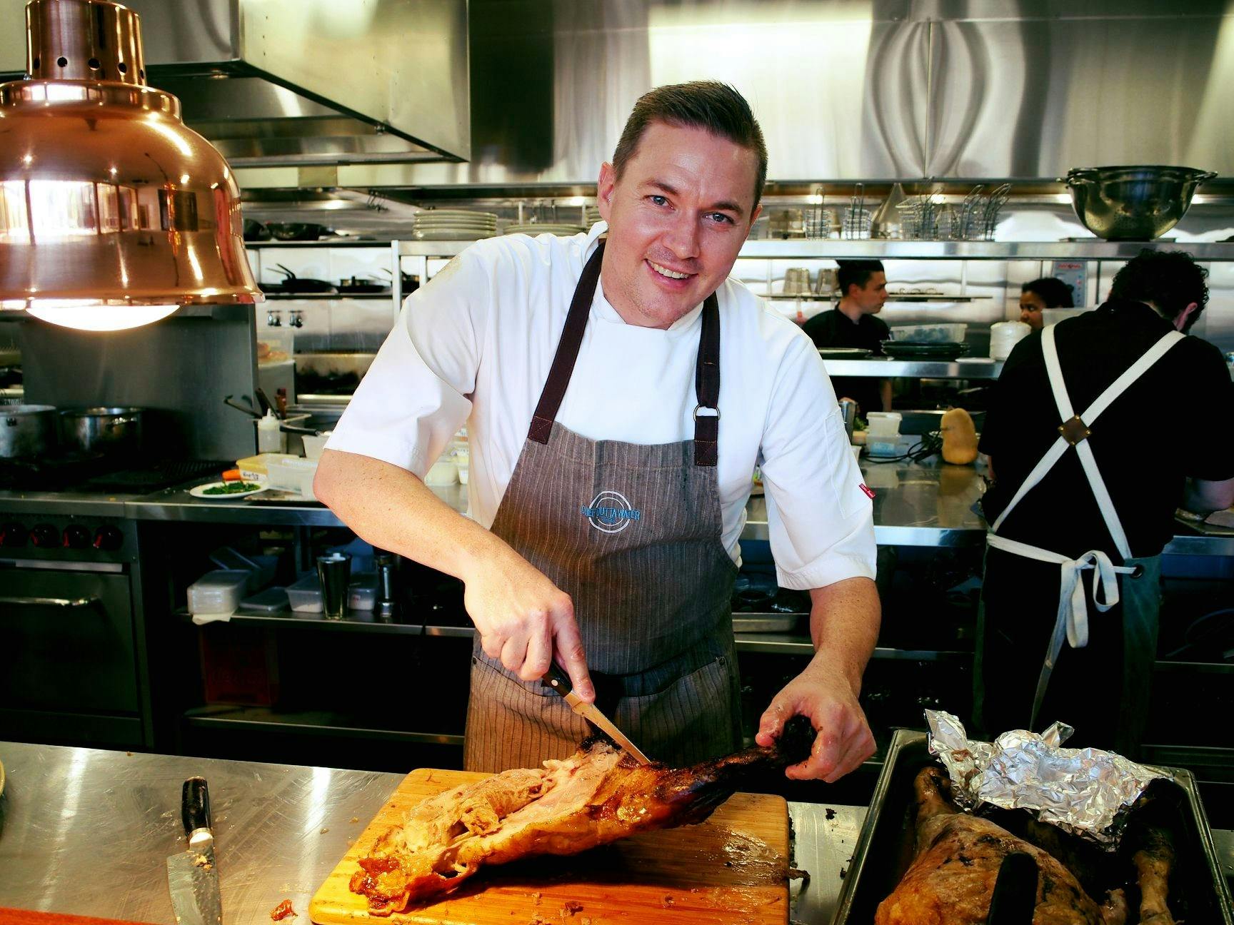 Chef Michael Brine preparing lamb