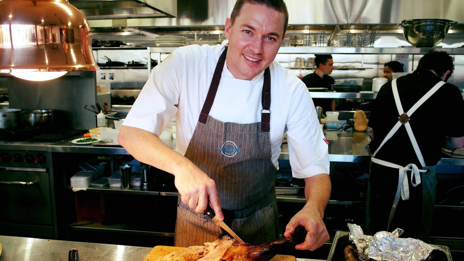 Chef Michael Brine preparing lamb