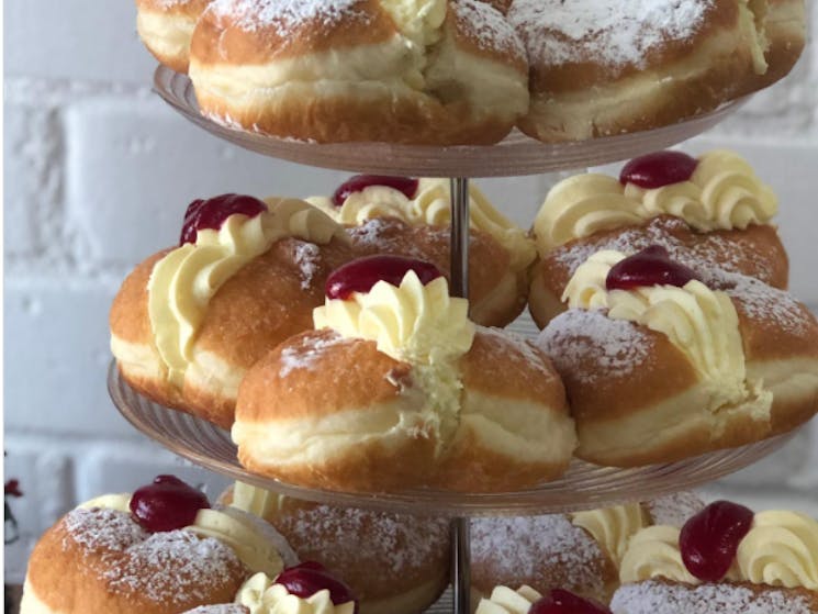 Stacked Cream and Jam Donuts