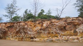 Two observation posts visible in the cliff face (right and left).