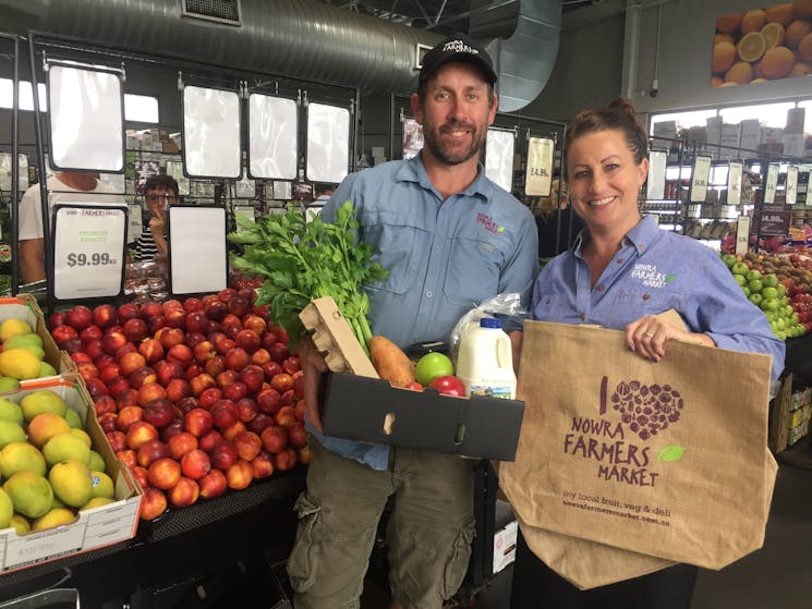 No plastic bags at the registers. BYO bags, take a free box or buy an NFM branded jute bag.