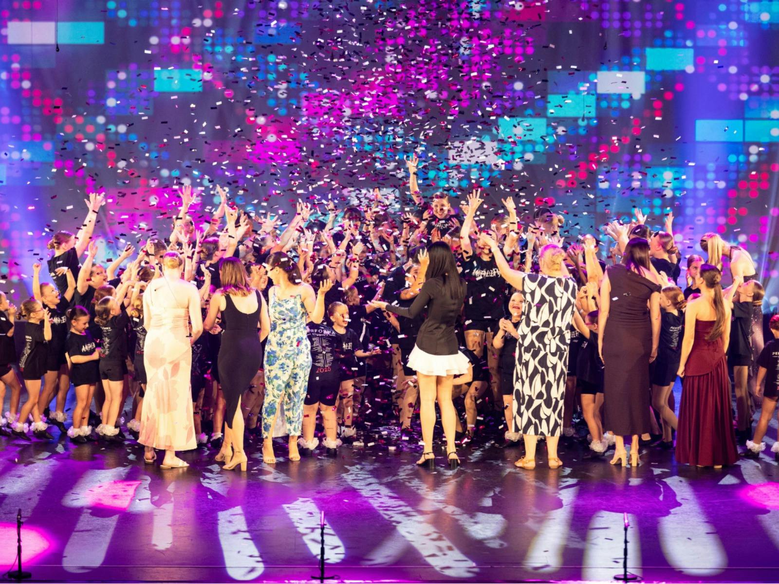 Large Dance group on stage
