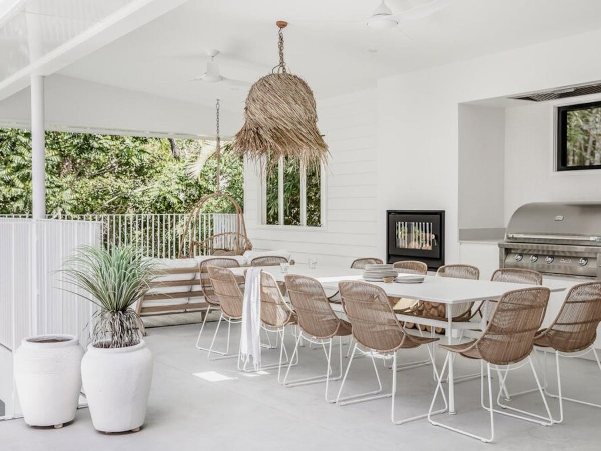 Open-plan living and dining seamlessly extend to a fully covered outdoor terrace and BBQ area Open-plan living and dining seamlessly extend to a fully covered outdoor terrace and BBQ area