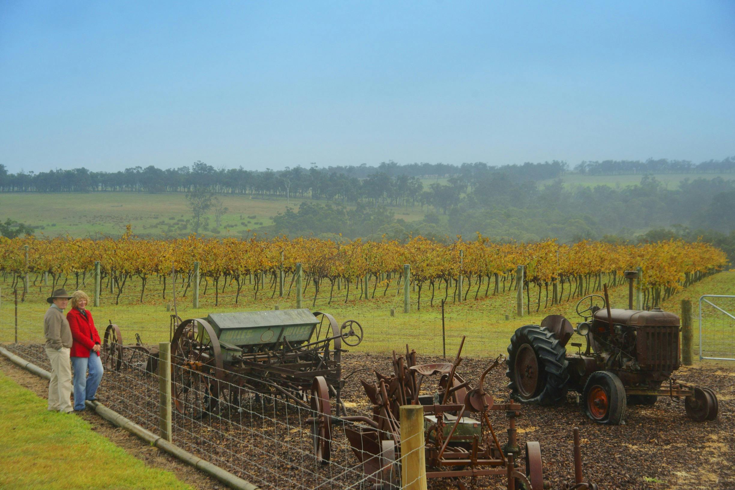 People looking at old machinery display and Windrush Winery near Mount Barker