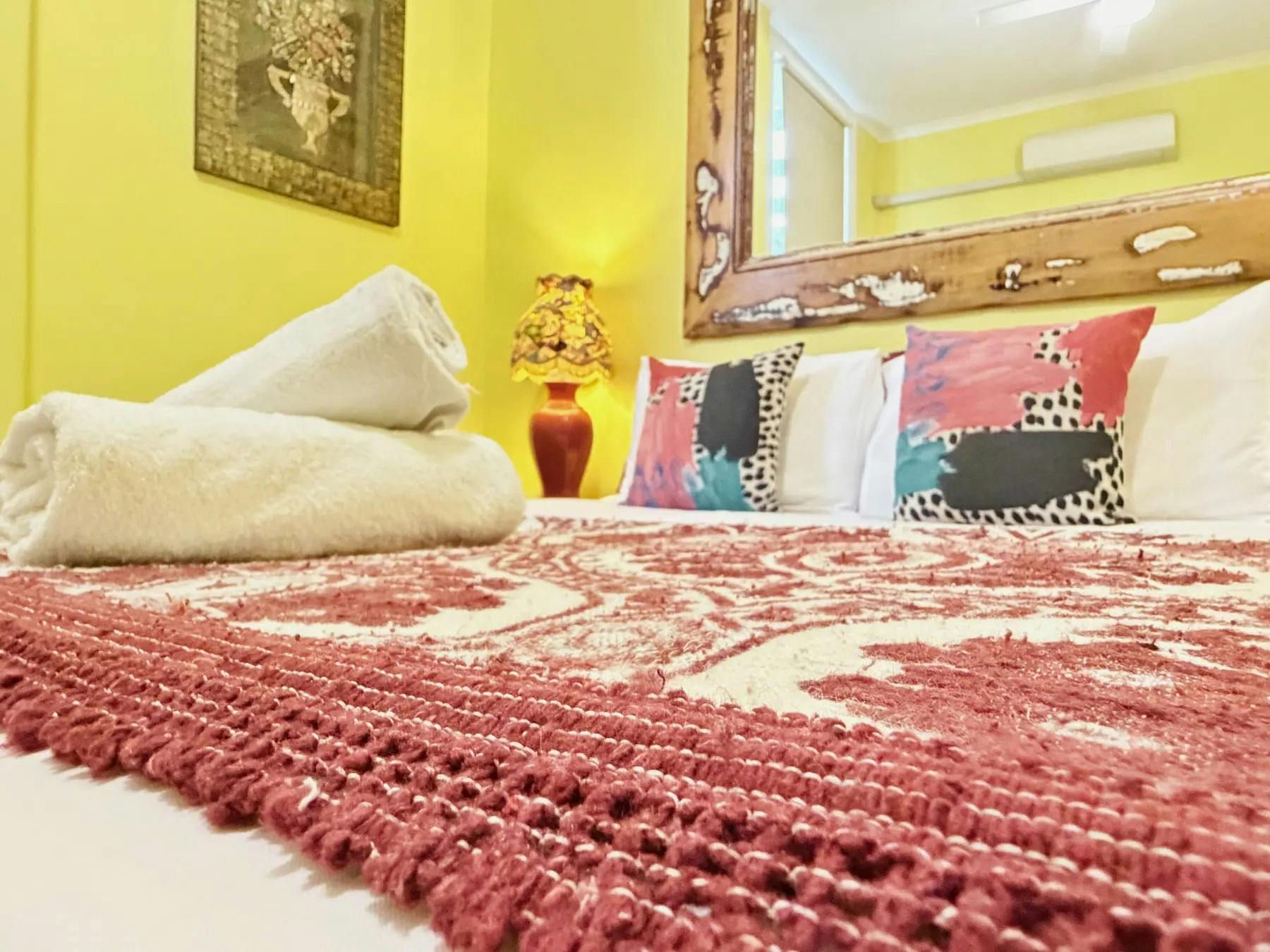 Queen bed and vintage styling in the Queen Deluxe Room at Vine Valley Inn
