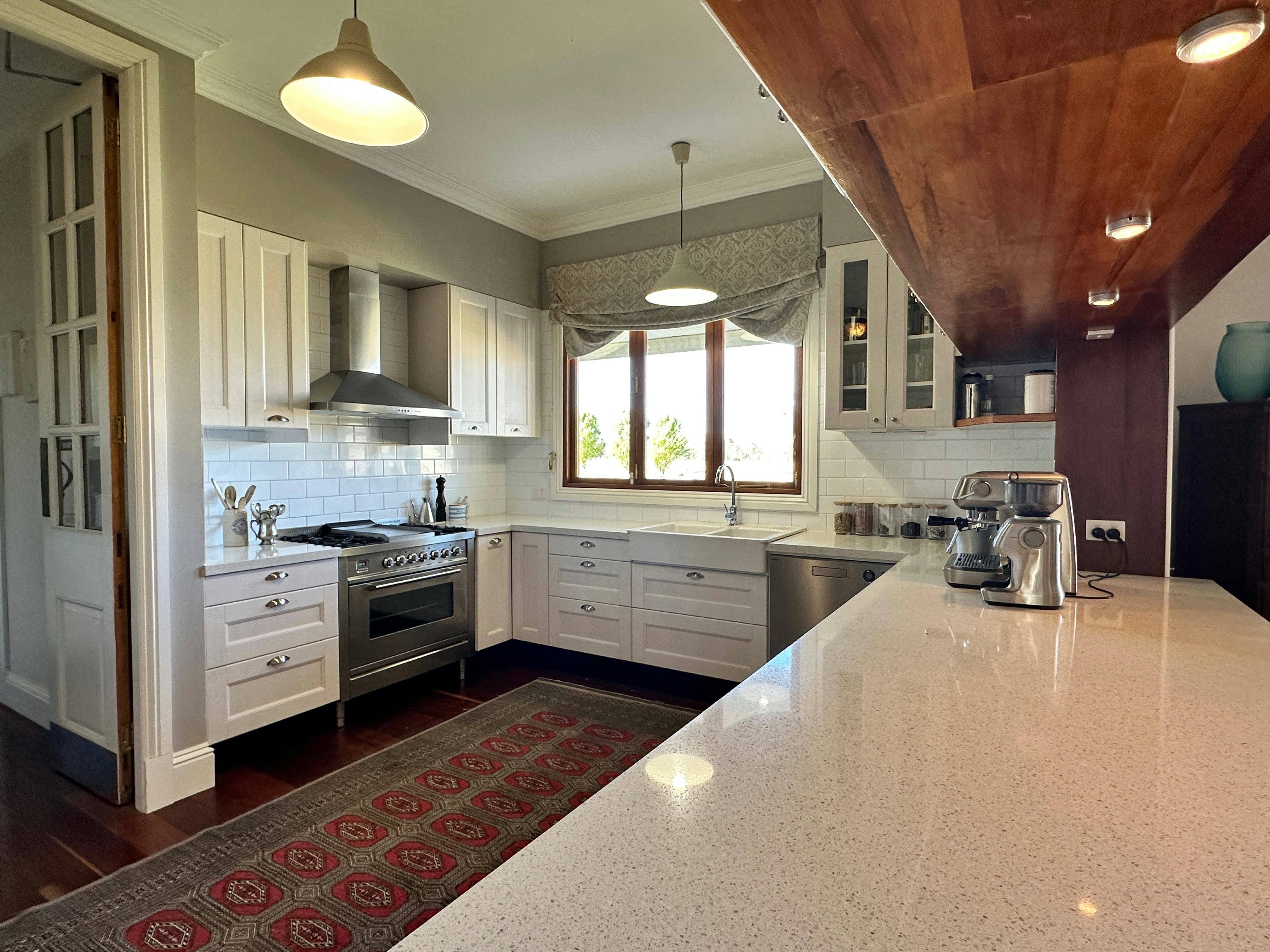 With  modern appliances such as a  dual boiler coffee machine and grinder