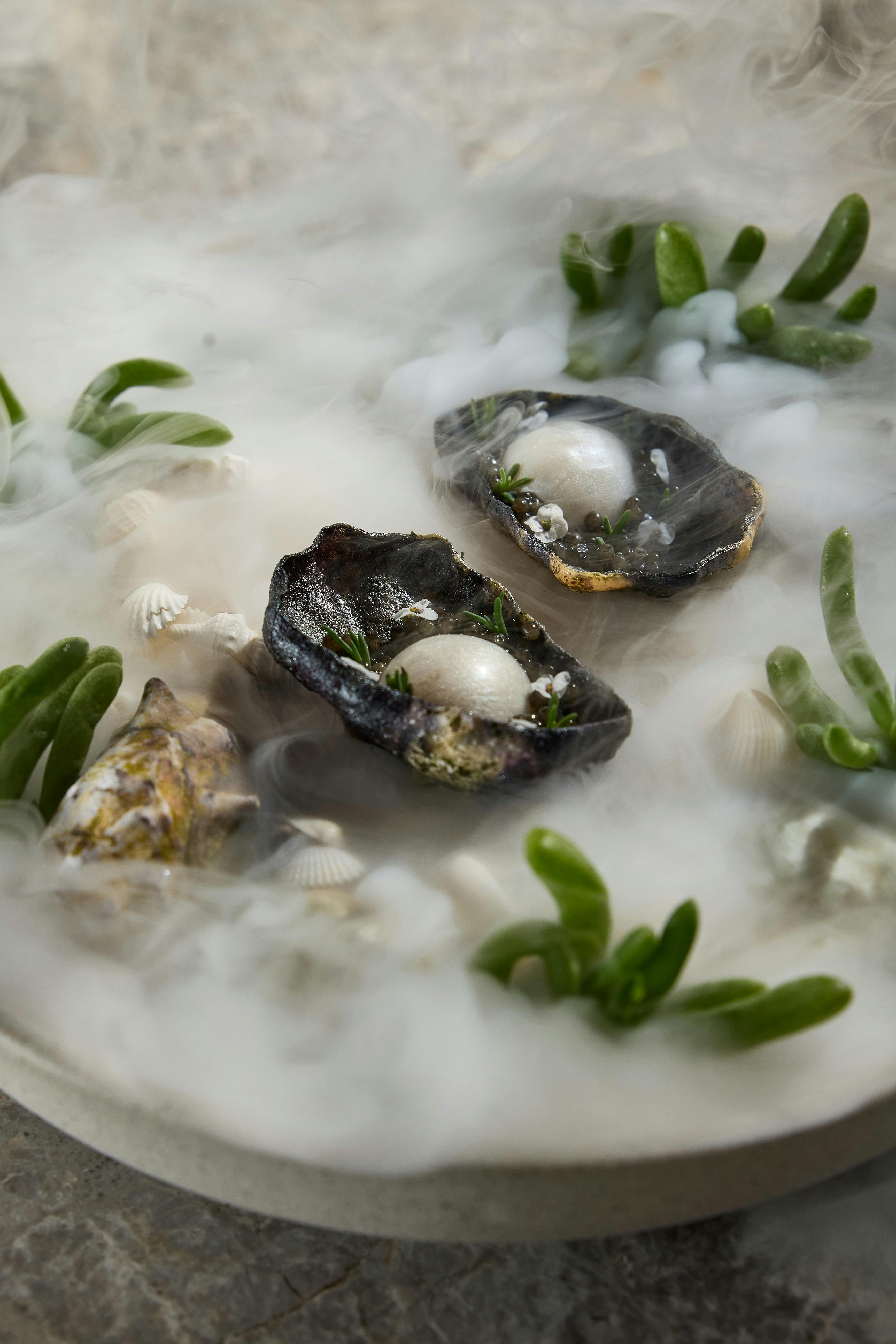 Oyster in shell restaurant dish
