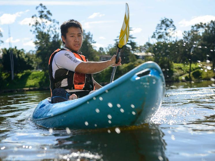 Man kayaking