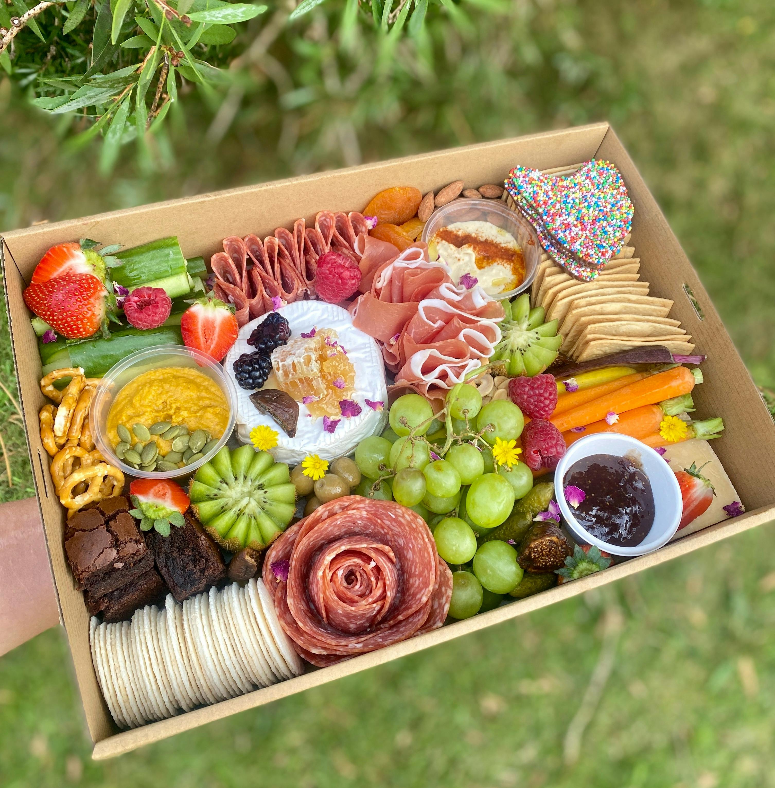 Grazing platter filled with delicious Tasmanian cheese and produce