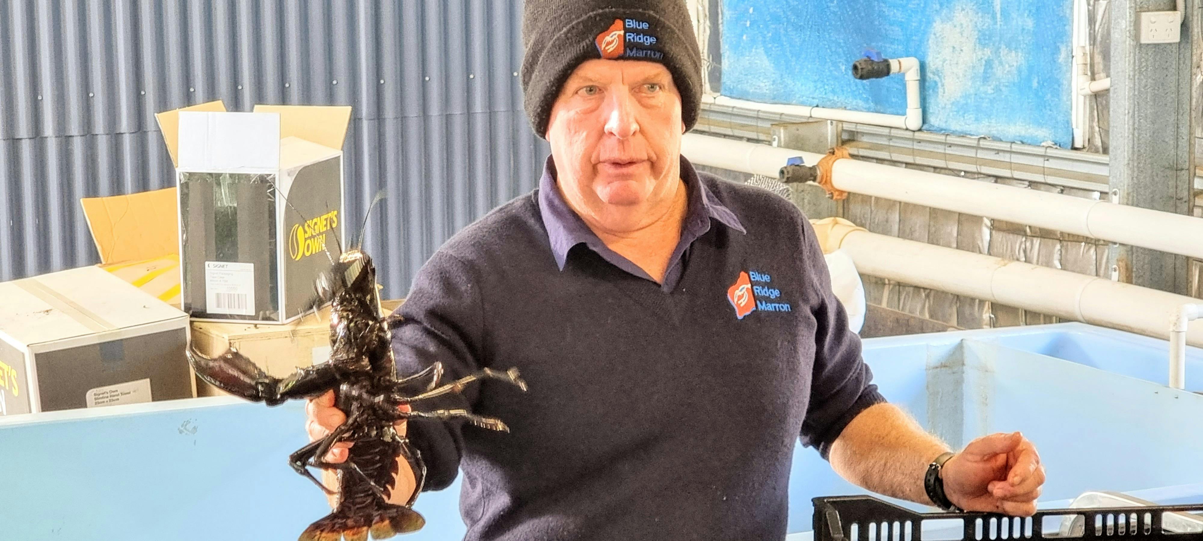 owner of Blue Ridge Marron holding a marron