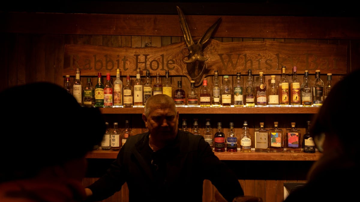Staff and patroons at the Rabbit Hole Whisky Bar at Balancing Heart Vineyard