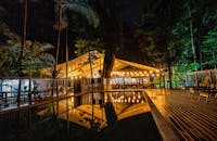 Pool surrounded by Rainforest beside Tides Bar & Restaurant